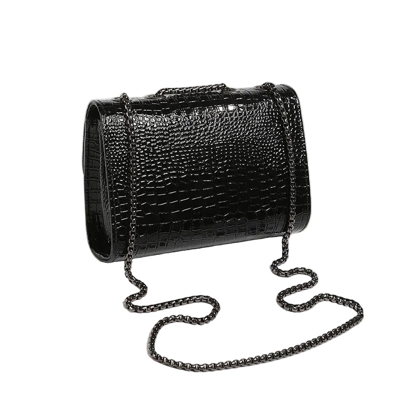Black faux leather crocodile clutch with modern chain design